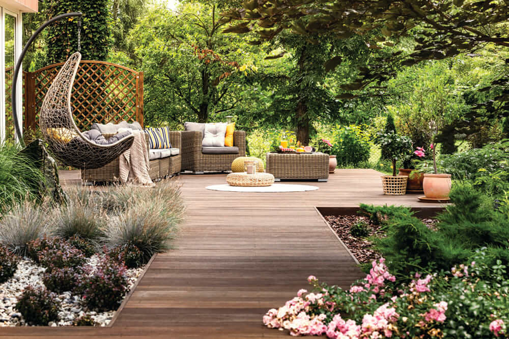 Landscaped garden with rattan seating